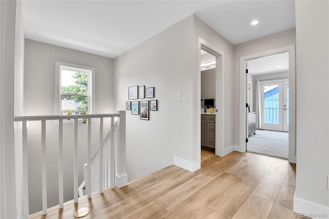3178 N Race St, Denver, CO 80205 - hallway with light wood-style flooring, an upstairs landing, healthy amount of natural light, recessed lighting, and baseboards