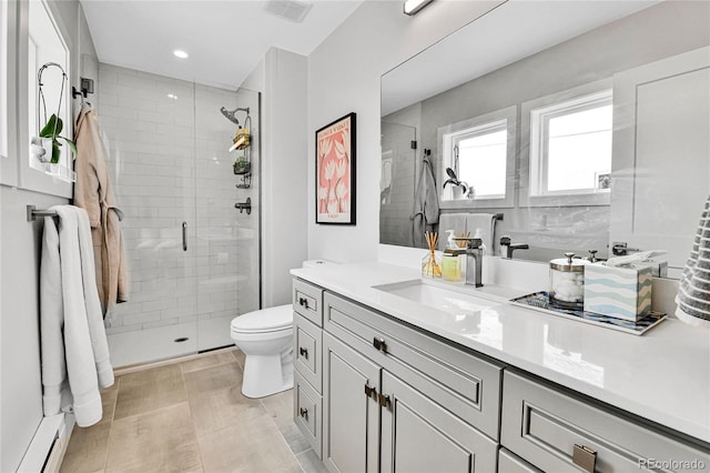 3178 N Race St, Denver, CO 80205 - full bath featuring baseboard heating, vanity, a shower stall, toilet, and recessed lighting