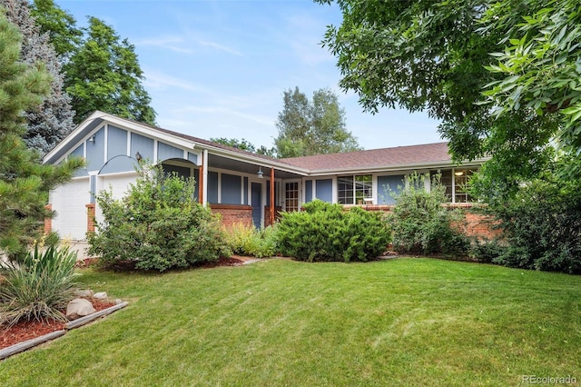 8369 W 77th Way, Arvada, CO 80005 - single story home featuring an attached garage, a front lawn, and brick siding