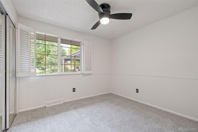 8369 W 77th Way, Arvada, CO 80005 - empty room with carpet flooring, a ceiling fan, and a textured ceiling