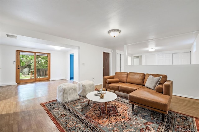 8369 W 77th Way, Arvada, CO 80005 - living room featuring wood finished floors