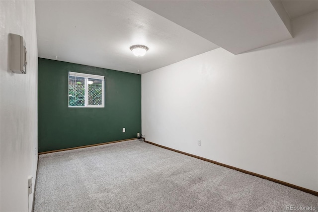 8369 W 77th Way, Arvada, CO 80005 - spare room featuring carpet and baseboards