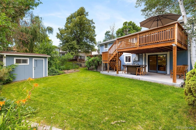 8369 W 77th Way, Arvada, CO 80005 - view of yard with a patio area, a deck, a shed, and stairway