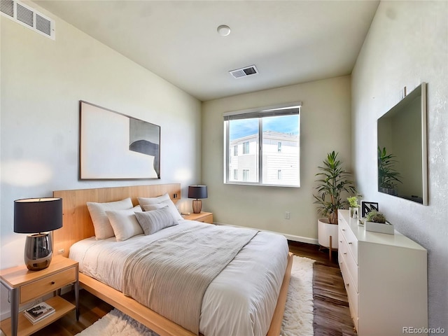 3865 Presidio Pt Unit 101, Colorado Springs, CO 80920 - bedroom featuring wood finished floors and baseboards