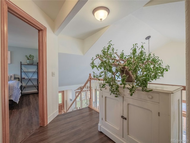 120 S San Juan Ave, Buena Vista, CO 81211 - corridor featuring an upstairs landing, dark wood-type flooring, vaulted ceiling, and baseboards