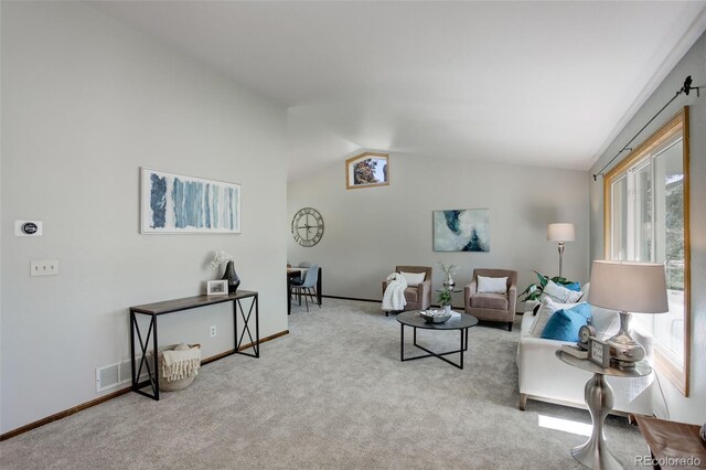 7877 W 110th Dr, Westminster, CO 80021 - living room with lofted ceiling, carpet flooring, and baseboards