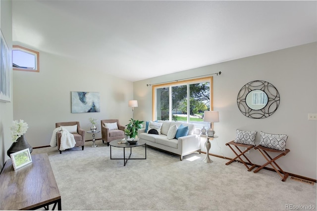 7877 W 110th Dr, Westminster, CO 80021 - living room featuring healthy amount of natural light, carpet floors, baseboards, and vaulted ceiling