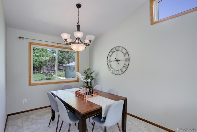 7877 W 110th Dr, Westminster, CO 80021 - dining room with a chandelier, light colored carpet, and baseboards