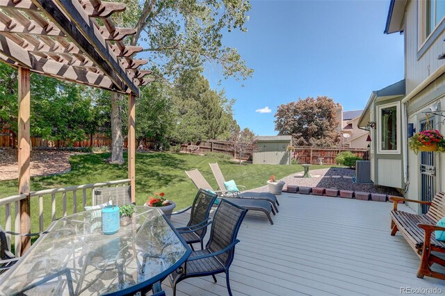 7877 W 110th Dr, Westminster, CO 80021 - wooden terrace featuring outdoor dining space and a pergola