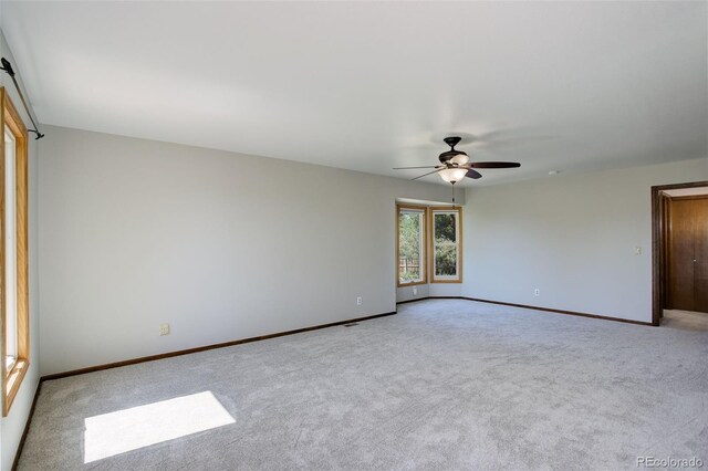 7877 W 110th Dr, Westminster, CO 80021 - spare room featuring carpet, ceiling fan, and baseboards