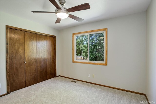 7877 W 110th Dr, Westminster, CO 80021 - unfurnished bedroom with carpet floors, a closet, baseboards, and ceiling fan