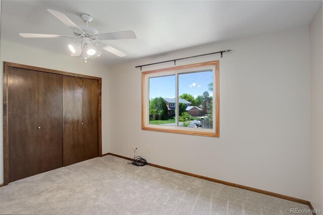7877 W 110th Dr, Westminster, CO 80021 - unfurnished bedroom with carpet, a closet, baseboards, and ceiling fan