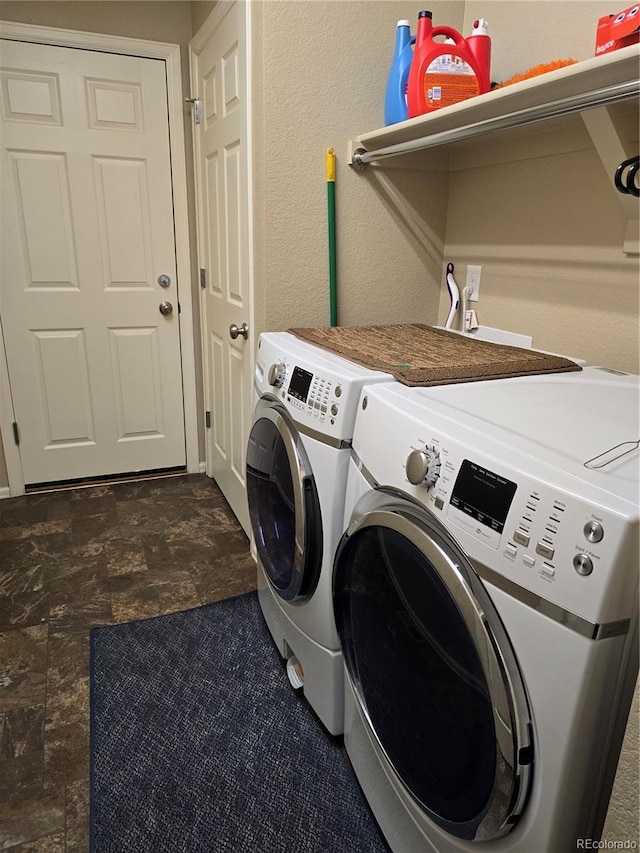 5131 Delphinium Cir, Brighton, CO 80601 - washroom with washer and dryer