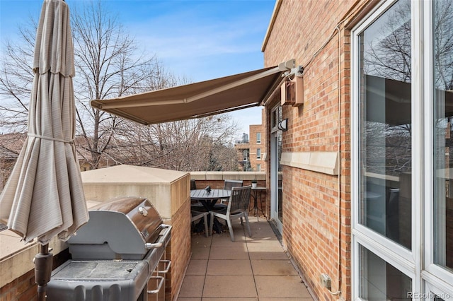 view of patio / terrace featuring a grill