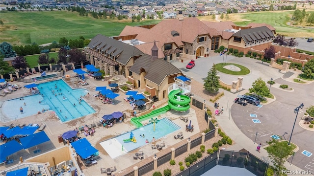 birds eye view of property with a residential view