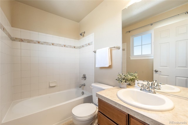 bathroom featuring shower / washtub combination, vanity, and toilet