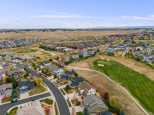 bird's eye view featuring golf course view and a residential view