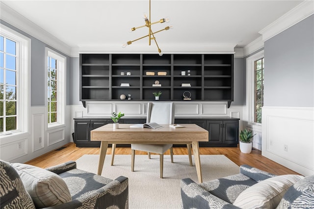 18963 E Long Ave, Centennial, CO 80016 - home office with a chandelier, crown molding, light wood-style floors, and a wainscoted wall