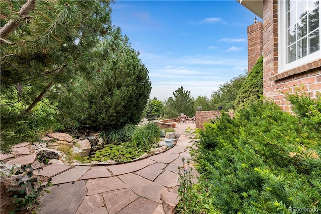 18963 E Long Ave, Centennial, CO 80016 - view of yard with an outdoor fire pit and a patio
