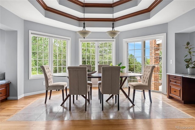 18963 E Long Ave, Centennial, CO 80016 - dining space with plenty of natural light, ornamental molding, and light wood-style floors