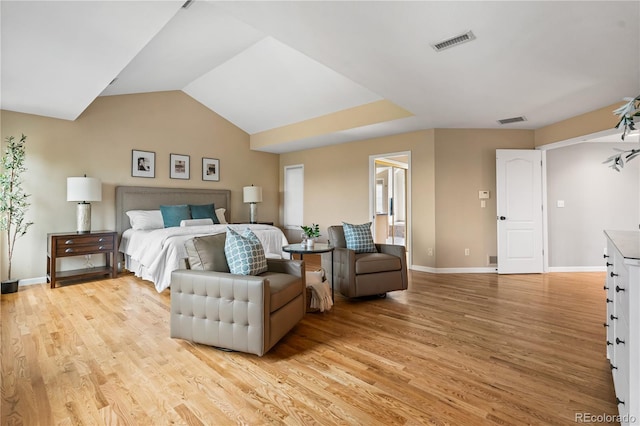 18963 E Long Ave, Centennial, CO 80016 - bedroom featuring light wood-style floors and vaulted ceiling