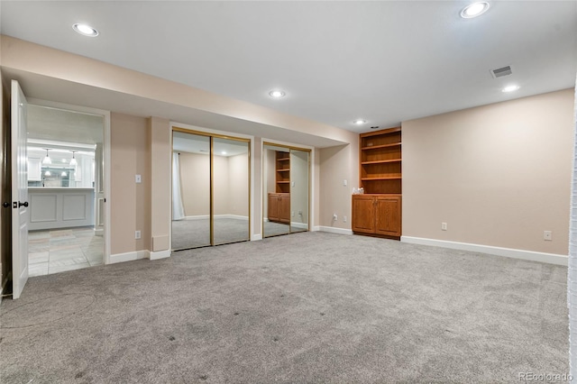 18963 E Long Ave, Centennial, CO 80016 - finished below grade area featuring carpet floors, recessed lighting, and built in features