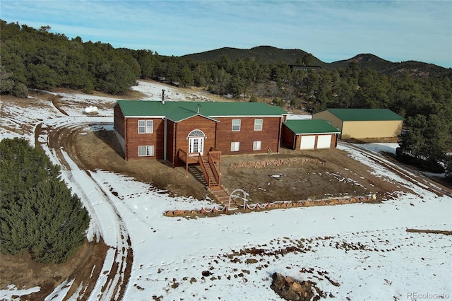 view of front of house with a mountain view