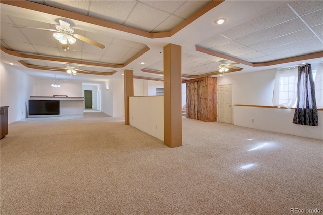 interior space with light carpet and a drop ceiling