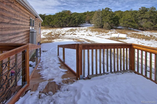 view of snow covered deck