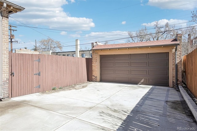 detached garage with fence