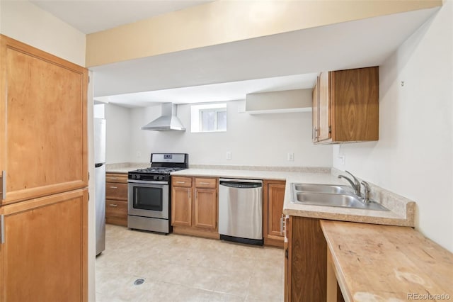 kitchen with a sink, light countertops, stainless steel appliances, wall chimney exhaust hood, and open shelves