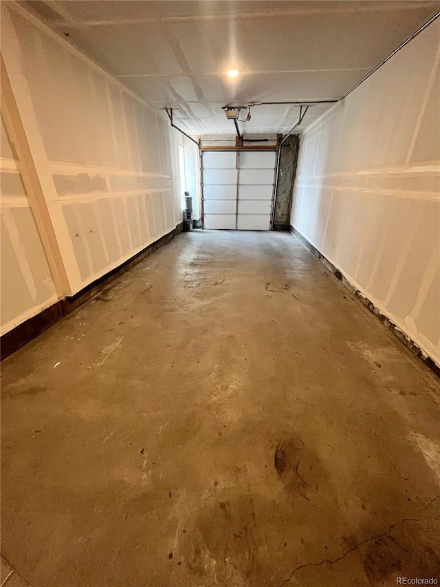 16841 Askins Loop Unit 208, Parker, CO 80134 - garage featuring a garage door opener