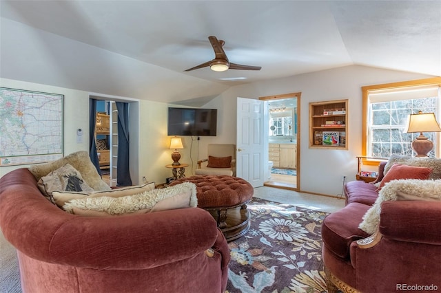 9185 US Highway 285, Salida, CO 81201 - living area featuring lofted ceiling, carpet, ceiling fan, and plenty of natural light