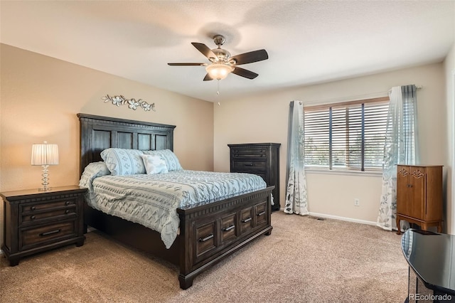 20336 E 48th Dr, Denver, CO 80249 - bedroom featuring light carpet, baseboards, and a ceiling fan