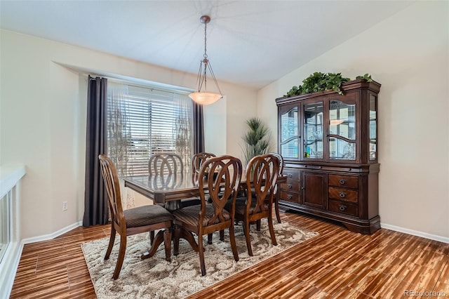 20336 E 48th Dr, Denver, CO 80249 - dining area with healthy amount of natural light, baseboards, and wood finished floors