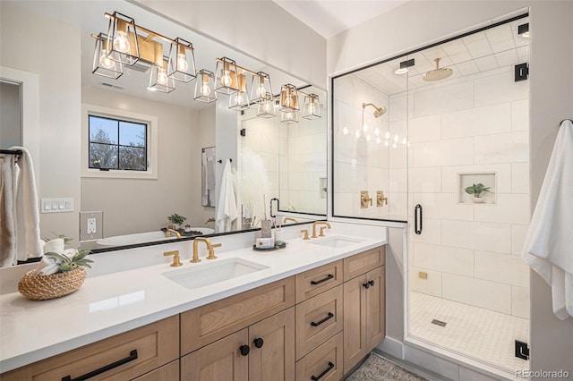 bathroom with vanity and an enclosed shower