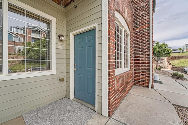 2705 S Danube Way Unit 110, Aurora, CO 80013 - view of exterior entry featuring brick siding