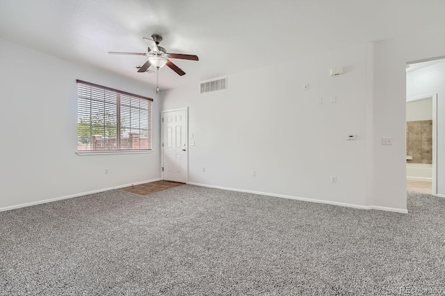 2705 S Danube Way Unit 110, Aurora, CO 80013 - empty room with a ceiling fan, carpet flooring, and baseboards
