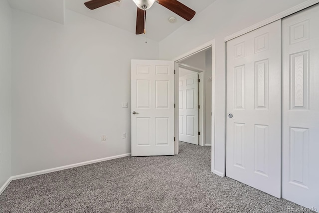 2705 S Danube Way Unit 110, Aurora, CO 80013 - unfurnished bedroom with carpet, a closet, baseboards, lofted ceiling, and ceiling fan