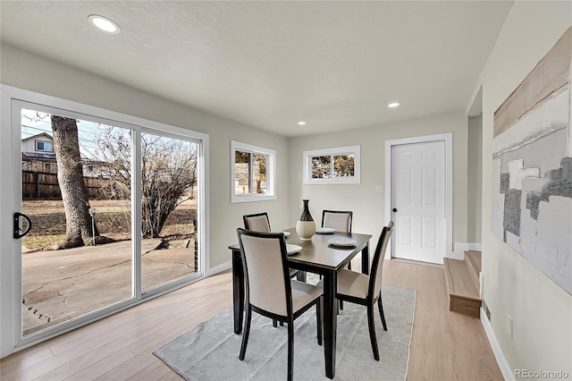 dining area featuring light hardwood / wood-style flooring