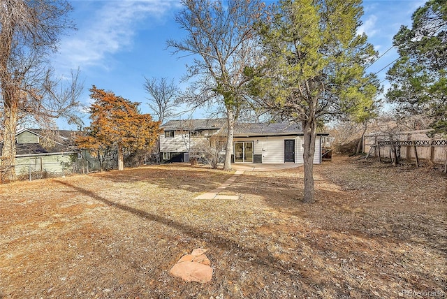 back of house with a patio area