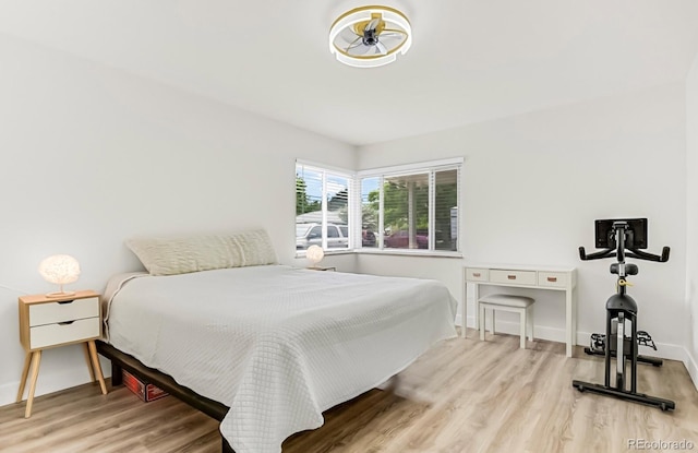 bedroom with light hardwood / wood-style flooring