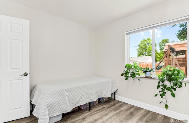 bedroom featuring hardwood / wood-style flooring