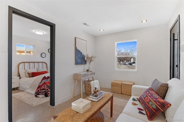 living room featuring plenty of natural light