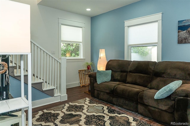 131 Faraday St, Monte Vista, CO 81144 - living room with wood finished floors, stairs, and recessed lighting