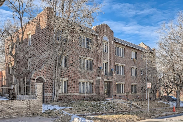 view of snow covered property