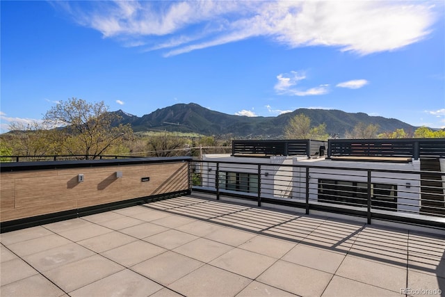 view of patio with a mountain view