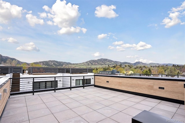 view of patio / terrace with a mountain view