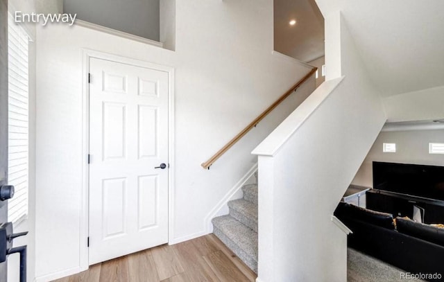 4443 N Quatar Ct, Aurora, CO 80019 - stairway with wood finished floors and recessed lighting