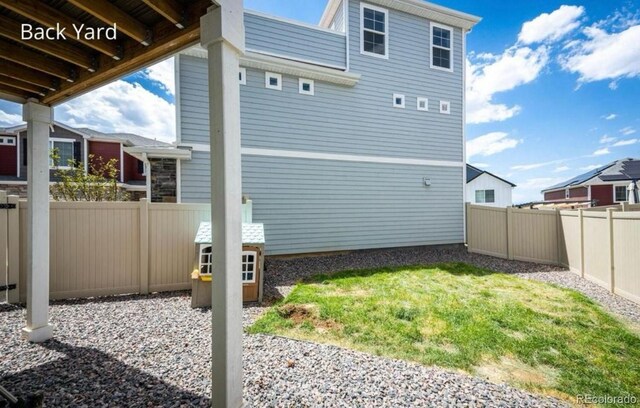 4443 N Quatar Ct, Aurora, CO 80019 - view of home's exterior with a fenced backyard
